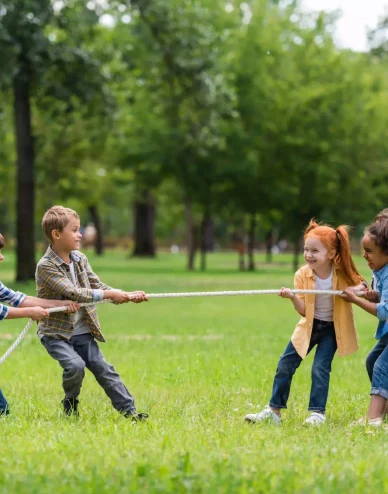 side-view-of-cute-little-multiethnic-children-pull-2023-11-27-05-03-20-utc copy